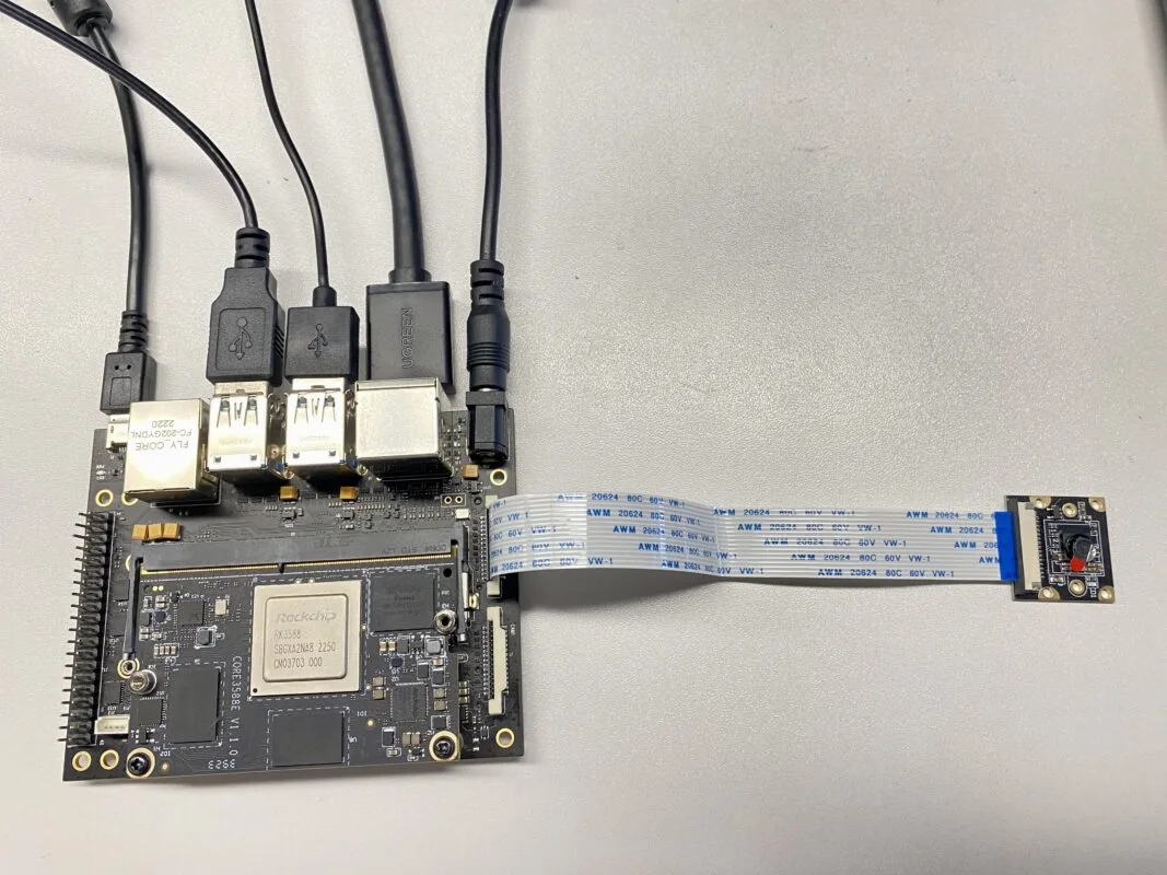 A camera module connected to a camera connector of the Leetop A206 with a ribbon cable
